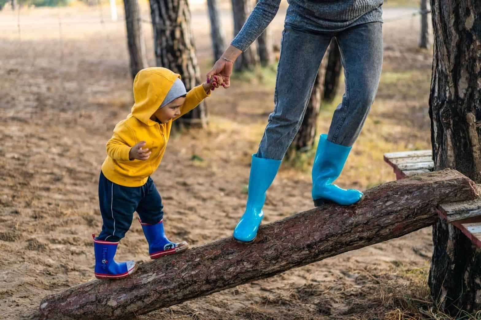 baby walking yellow hood