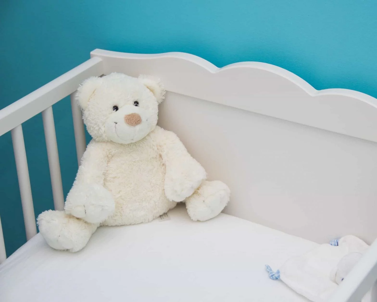 toy bear in the cradle